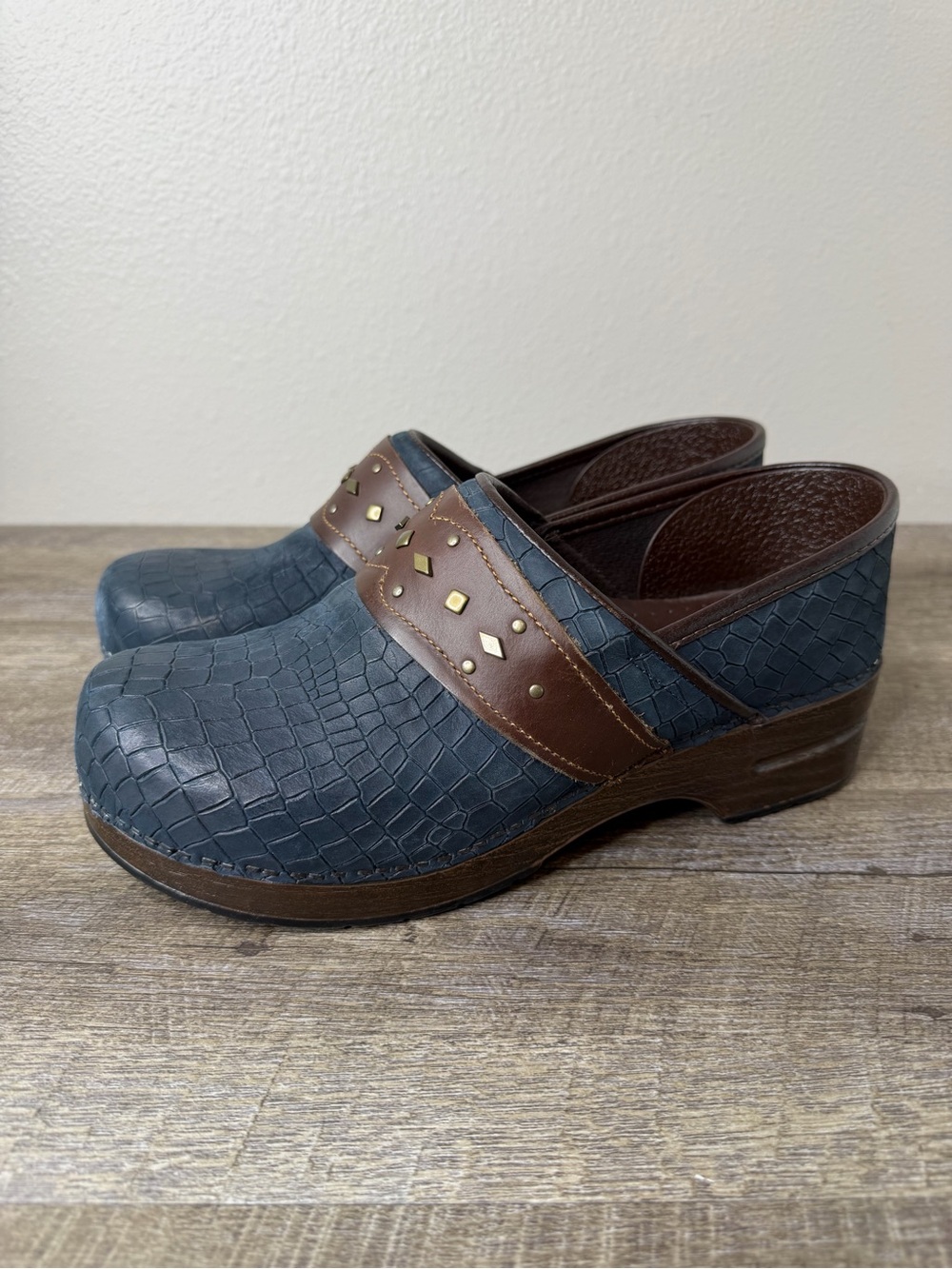 Dansko Blue Textured Leather Clogs with Brown Studded Strap